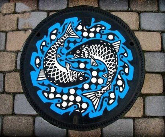 2 Japanese manhole covers